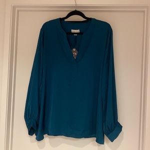 Beautiful blouse in teal